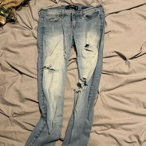 Light wash super skinny ripped jeans 25x30